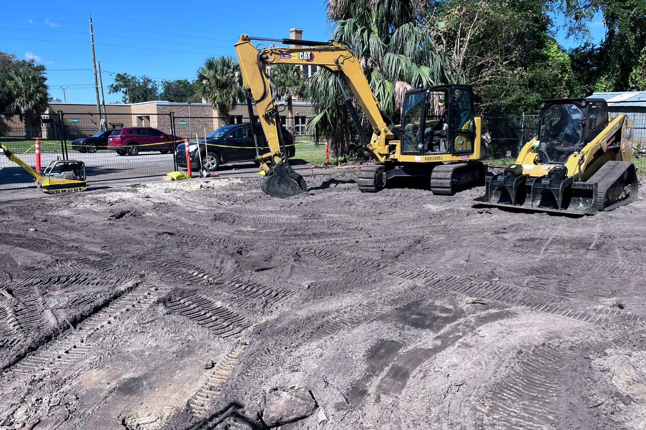 ECC parking lot mid construction - bobcat and excavator 