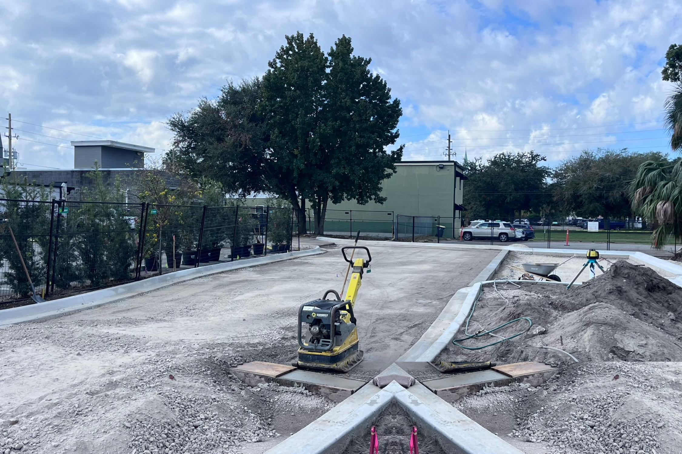 ECC parking lot mid construction - bobcat and excavator 